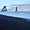 Contraste plage de sable noir et neige à Vík