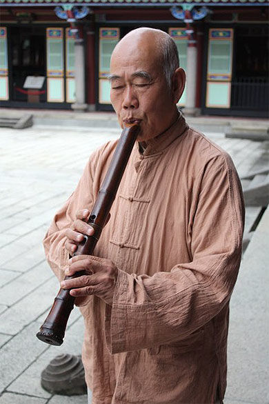 Flute player in Confucius Temple 