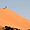 Moul N'Aga - Randonneur au sommet de la dune