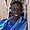 Femme de Tanzanie près de son échoppe 
