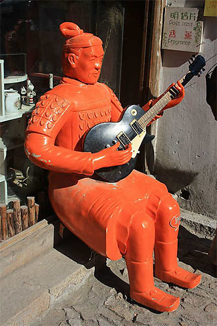Bouddha à la guitare