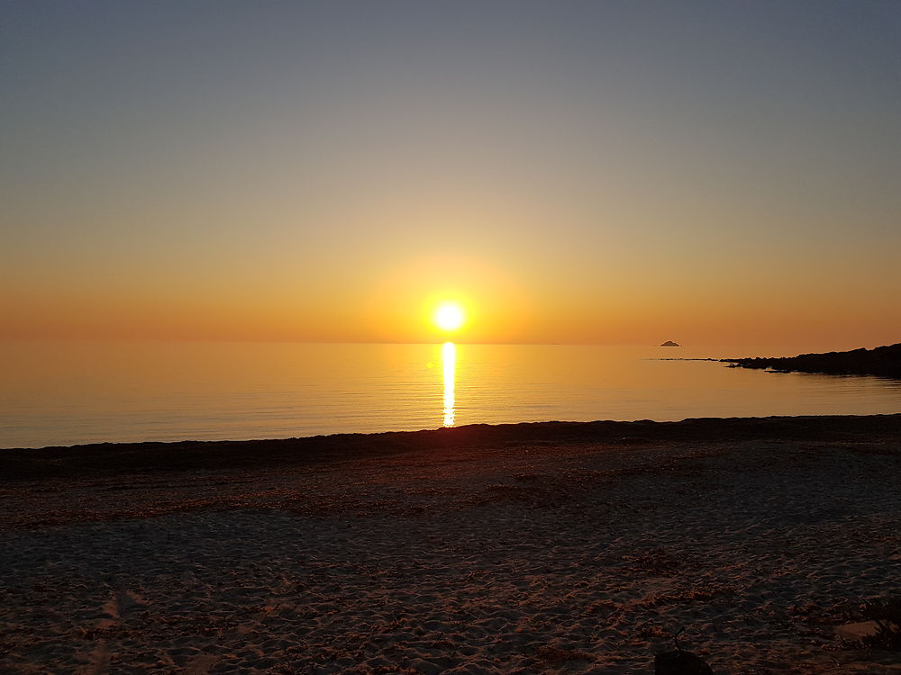 Coucher de soleil sur la plage de Little Capo