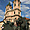 Place Dobo avec église baroque et statues