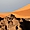 Tin Zaouaten - Dune et roche dorées par le soleil