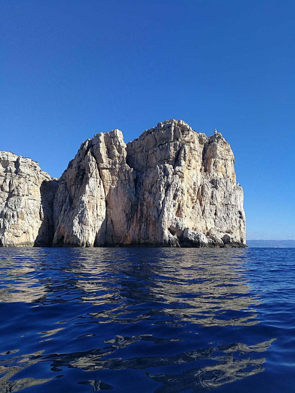 Le cap Caccia vu de la mer