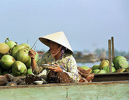 Scène de vie sur le Mekong